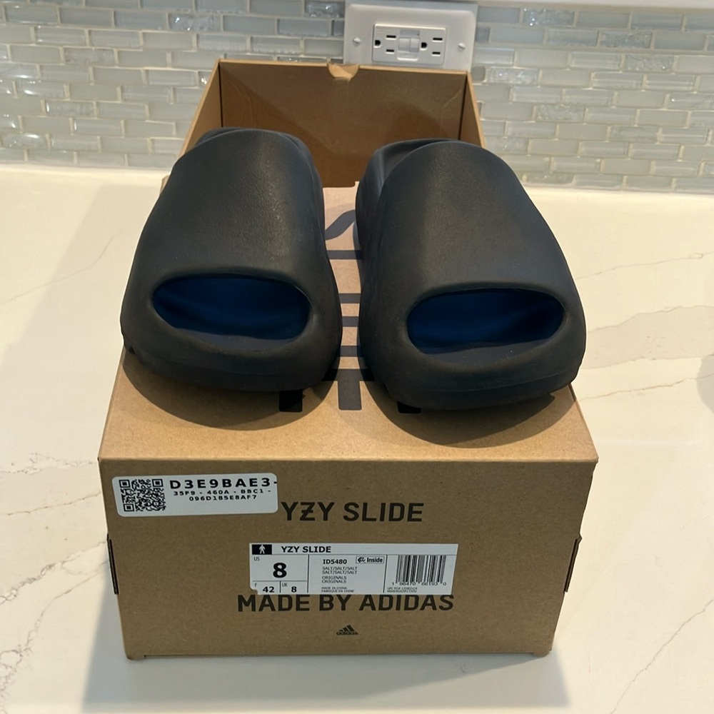 adidas Black Slippers with Comfortable Flat Sole and Minimalist Design